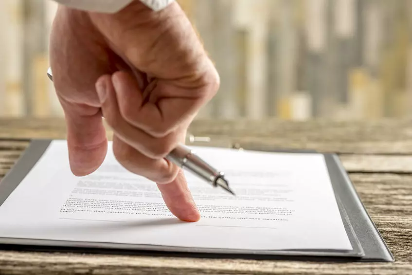 Family meeting with legal advisor, showing when a Will is crucial—highlighting Trusted Will Writing Corby for essential life planning.